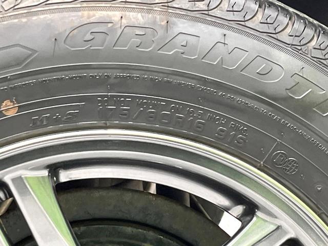 ジムニー ランドベンチャー 4WD ターボ 禁煙車 ハーフレザーシート シートヒーター ETC 純正16インチアルミ CD(58枚目)