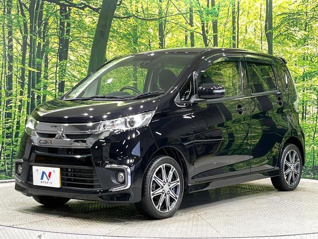 eKカスタム Tセーフティパッケージ 4WD ターボ e-アシスト 全周囲カメラ シートヒーター スマートキー HIDヘッド オートハイビーム 車線逸脱警報 オートライト オートエアコン 純正15インチアルミ CD(50枚目)