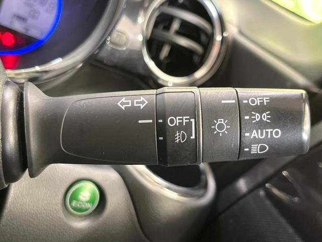 N-BOXカスタム G・ターボLパッケージ 4WD ターボ SDナビ バックカメラ 禁煙車 ハーフレザーシート ドラレコ スマートキー HIDヘッド ビルトインETC クルコン オートライト オートエアコン 純正15インチアルミ(32枚目)