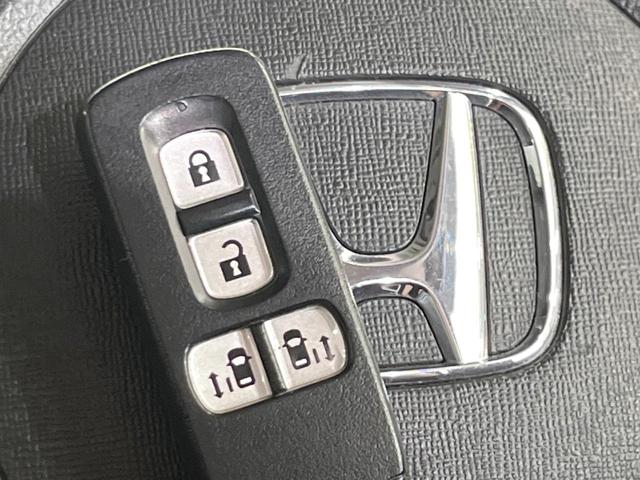 N-BOXカスタム G・ターボLパッケージ 4WD ターボ SDナビ バックカメラ 禁煙車 ハーフレザーシート ドラレコ スマートキー HIDヘッド ビルトインETC クルコン オートライト オートエアコン 純正15インチアルミ(34枚目)