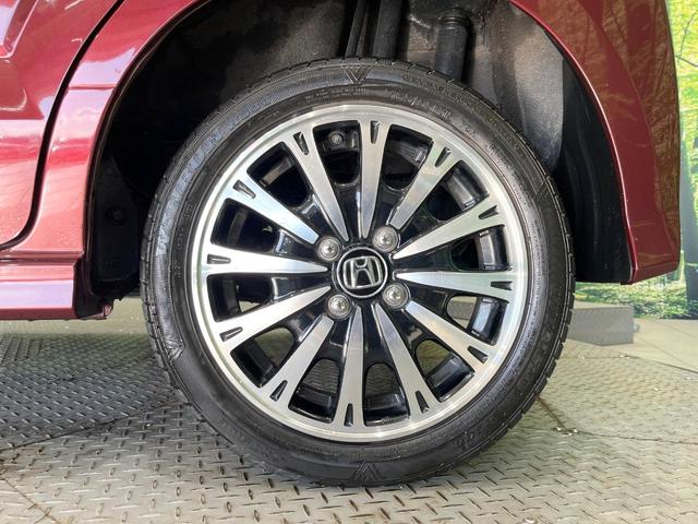 N-BOXカスタム G・ターボLパッケージ 4WD ターボ SDナビ バックカメラ 禁煙車 ハーフレザーシート ドラレコ スマートキー HIDヘッド ビルトインETC クルコン オートライト オートエアコン 純正15インチアルミ(71枚目)