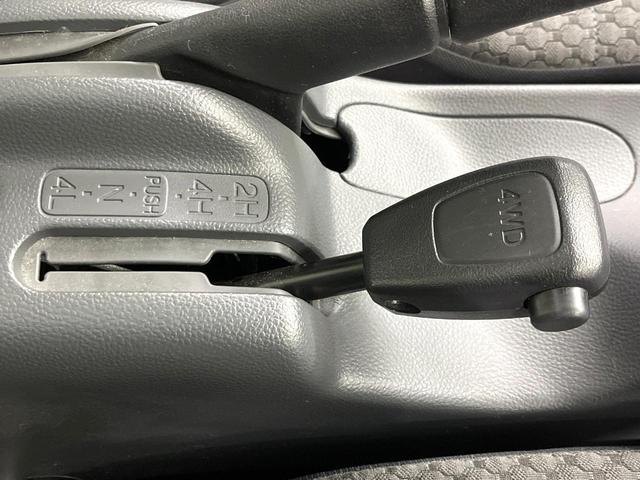 キャリイトラック KX 4WD MT車 禁煙車 CD ドアバイザー ヘッドライトレベライザー トラクションコントロール(24枚目)