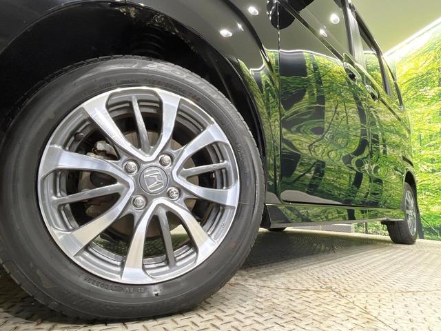 N-BOXカスタム L 4WD 禁煙車 両側電動ドア ナビ バックカメラ ホンダセンシング レーダークルーズ ドラレコ コーナーセンサー スマートキー LEDヘッド ETC 純正14インチアルミ 車線逸脱警報 電動パーキング(13枚目)