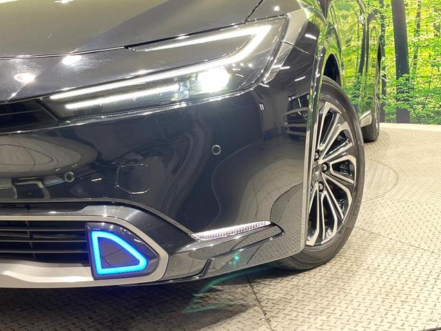 プリウス Ｚ　４ＷＤ　禁煙車　１２。３インチディスプレイオーディオ　全周囲カメラ　寒冷地仕様　プリクラッシュセーフティ　レーダークルーズ　半革シート　前席シートエアコン　パワーシート　コーナーセンサー　スマートキー（12枚目）