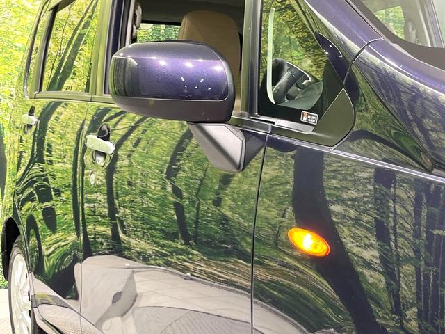 ムーヴ Ｘ　４ＷＤ　禁煙車　スマートキー　純正１４インチアルミ　オートライト　オートエアコン　ＣＤ　アイドリングストップ（30枚目）