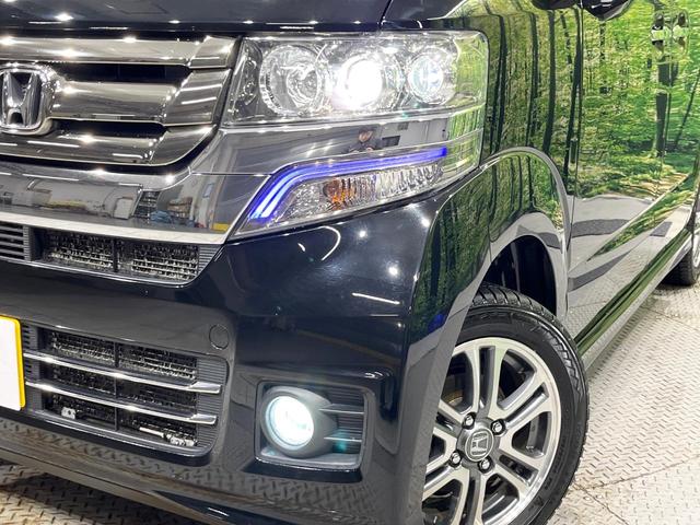 Ｎ－ＢＯＸカスタム Ｇ・Ｌパッケージ　４ＷＤ　電動スライドドア　ＳＤナビ　シートヒーター　スマートキー　ビルトインＥＴＣ　純正１４インチアルミ　オートライト　オートエアコン　ＣＤ再生　ＨＩＤヘッド　アイドリングストップ　横滑り防止装置（12枚目）