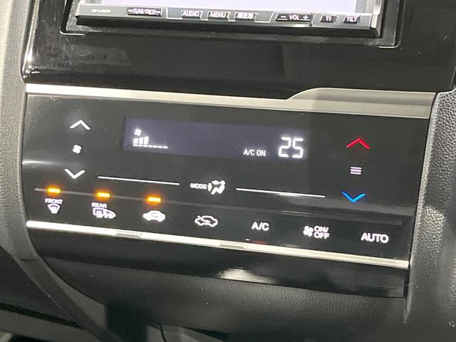 フィット １３Ｇ・Ｌパッケージ　４ＷＤ　禁煙車　寒冷地仕様　Ｂｌｕｅｔｏｏｔｈ　フルセグ　ＨＩＤヘッドライト　オートライト　アイドリングストップ　横滑り防止装置　オートエアコン　ＣＤ／ＤＶＤ再生　電動格納ミラー　チップアップシート（6枚目）