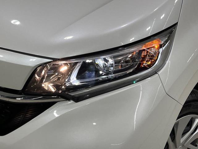 フリード Ｇ　本州仕入れ　４ＷＤ　寒冷地仕様　両側電動ドア　９インチ純正ＳＤナビ　バックカメラ　寒冷地仕様　ホンダセンシング　レーダークルーズ　禁煙車　ドラレコ　コーナーセンサー　スマートキー　ＬＥＤヘッド　ＥＴＣ（14枚目）