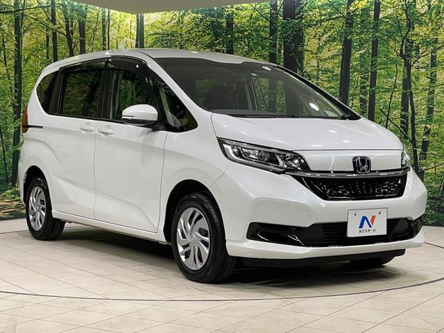 フリード Ｇ　本州仕入れ　４ＷＤ　寒冷地仕様　両側電動ドア　９インチ純正ＳＤナビ　バックカメラ　寒冷地仕様　ホンダセンシング　レーダークルーズ　禁煙車　ドラレコ　コーナーセンサー　スマートキー　ＬＥＤヘッド　ＥＴＣ（17枚目）