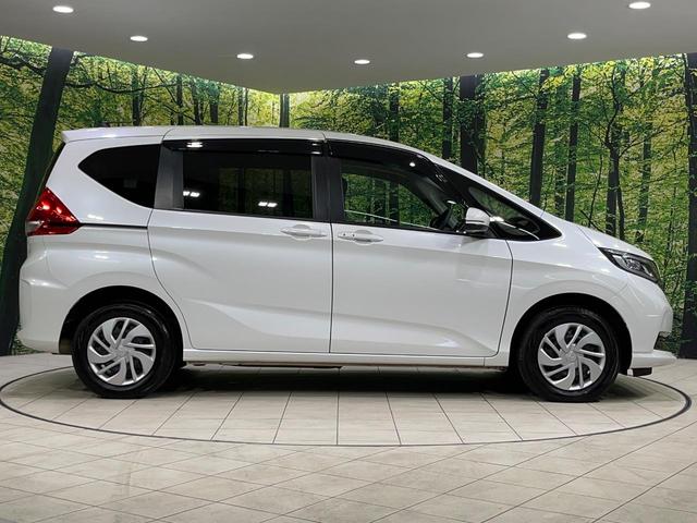 フリード Ｇ　本州仕入れ　４ＷＤ　寒冷地仕様　両側電動ドア　９インチ純正ＳＤナビ　バックカメラ　寒冷地仕様　ホンダセンシング　レーダークルーズ　禁煙車　ドラレコ　コーナーセンサー　スマートキー　ＬＥＤヘッド　ＥＴＣ（24枚目）