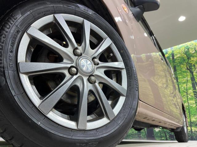 ステラ Ｌ　４ＷＤ　禁煙車　寒冷地仕様　シートヒーター　１４インチアルミホイール　ＣＤ再生　横滑り防止装置　電動格納ミラー　盗難防止装置　プライバシーガラス　ドアバイザー　シートアンダーボックス　バニティミラー（14枚目）