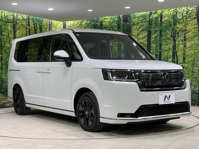 ステップワゴン スパーダ 4WD 両側電動ドア メモリーナビ バックカメラ 寒冷地仕様 ホンダセンシング レーダークルーズ 禁煙車 電動リアゲート ハーフレザーシート シートヒーター ドラレコ コーナーセンサー レーンキープ(17枚目)