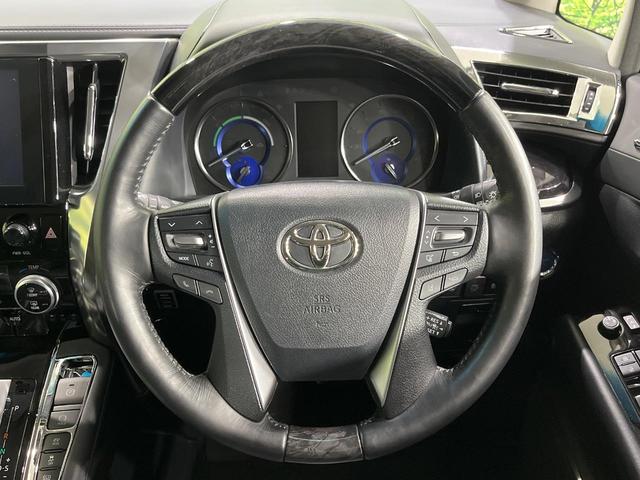 アルファードハイブリッド ＳＲ　Ｃパッケージ　４ＷＤ　寒冷地仕様　両側電動ドア　純正９インチディスプレイオーディオ　後席モニター　バックカメラ　ＡＣ１００Ｖ電源　セーフティーセンス　レーダークルーズ　禁煙車　パワーバックドア　合皮シート（11枚目）