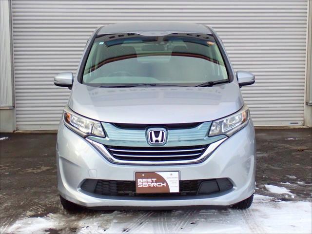 フリードハイブリッド ハイブリッド・Ｇホンダセンシング　４ＷＤ　本州仕入れ　ドライブレコーダー　フルセグ対応ナビ　バックカメラ　シートヒーター　ヒーテッドドアミラー　フロントガラス熱線　ＥＴＣ　チップアップシート　クルーズコントロール　Ｂｌｕｅｔｏｏｔｈ（3枚目）