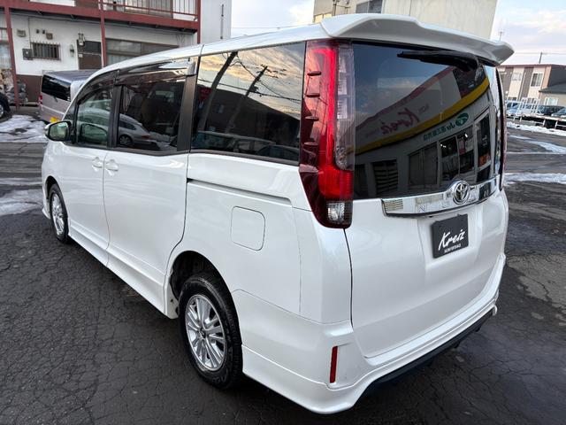 ノア Ｇ　４ＷＤ・車検整備付・ＢＴ付純正９型ナビＴＶ・Ｂカメラ・ＡＢＳ・Ｗ－ＳＲＳ・スマートキー・ＴＲＤエアロ・純正ＬＥＤ・両側ＰＳＤ・ＣＶＴ・７人乗り・フォグ・Ｅスタ・クルコン・ステアＳＷ・ＥＴＣ・Ｒヒーター（8枚目）
