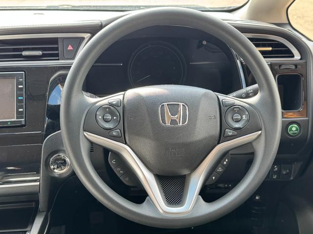 シャトル ハイブリッド ホンダセンシング 4WD ワイパーデアイサー レーンキーピング BTオーディオ 追従クルコン ステアリングスイッチ 純正SDナビ バックカメラ(4枚目)