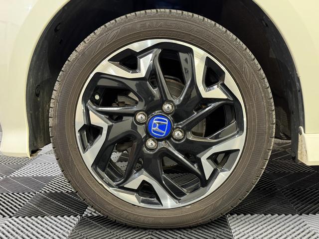 N-BOXカスタム G・EXターボホンダセンシング 4WD ミラーヒーター 純正エンジンスターター 社外足廻り 追従クルコン BT シートヒーター 純正メモリーナビ バックカメラ(24枚目)