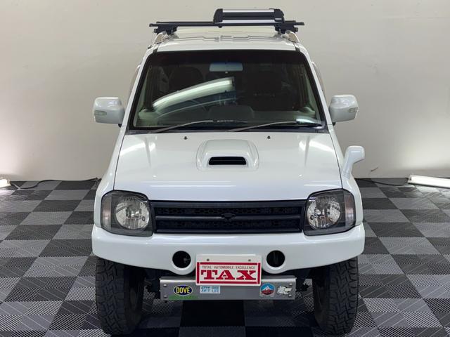 ジムニー ワイルドウインド 4WD 社外前後バンパー 社外16インチアルミ オープンカントリー 社外マフラー ルーフレール シートヒーター リフトアップ 寒冷地仕様 バックカメラ(14枚目)