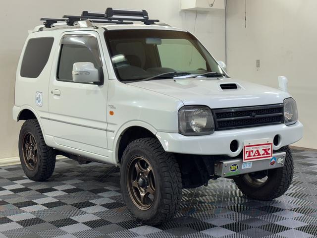 ジムニー ワイルドウインド 4WD 社外前後バンパー 社外16インチアルミ オープンカントリー 社外マフラー ルーフレール シートヒーター リフトアップ 寒冷地仕様 バックカメラ(15枚目)