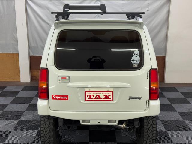 ジムニー ワイルドウインド 4WD 社外前後バンパー 社外16インチアルミ オープンカントリー 社外マフラー ルーフレール シートヒーター リフトアップ 寒冷地仕様 バックカメラ(16枚目)