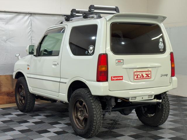ジムニー ワイルドウインド 4WD 社外前後バンパー 社外16インチアルミ オープンカントリー 社外マフラー ルーフレール シートヒーター リフトアップ 寒冷地仕様 バックカメラ(17枚目)
