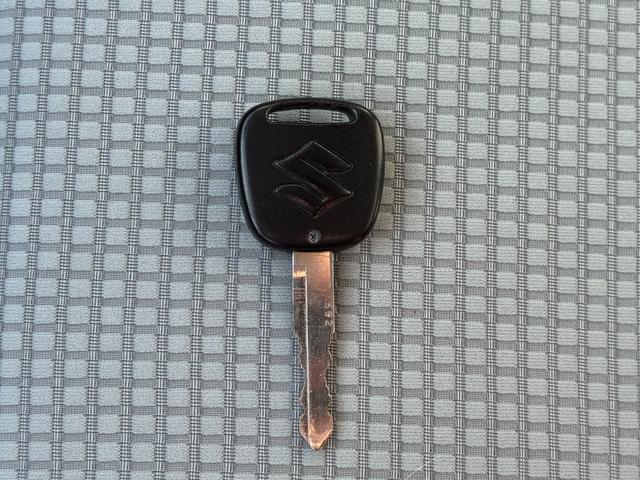 アルト L レーダーブレーキ装着車 4WD 純正CDデッキ AUX 前席シートヒーター ライトレベライザー アイドリングストップ キーレス レーダーブレーキ(18枚目)