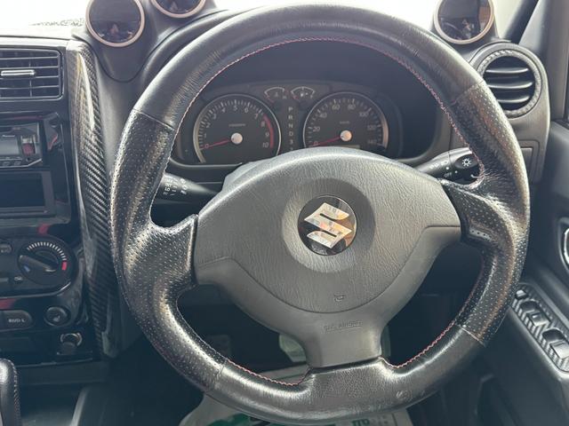 ジムニー クロスアドベンチャー 4WD 社外エンジンスターター リフトアップ 社外足廻り シートヒーター ミラーヒーター 追加メーター 社外マフラー ハーフレザーシート(4枚目)