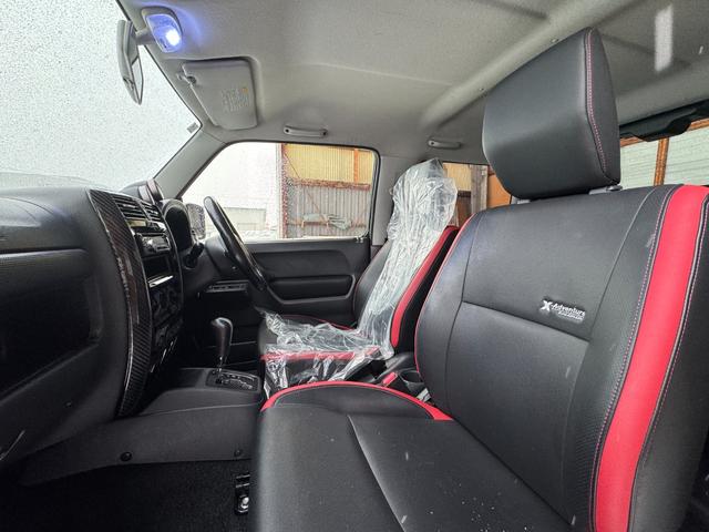 ジムニー クロスアドベンチャー 4WD 社外エンジンスターター リフトアップ 社外足廻り シートヒーター ミラーヒーター 追加メーター 社外マフラー ハーフレザーシート(5枚目)