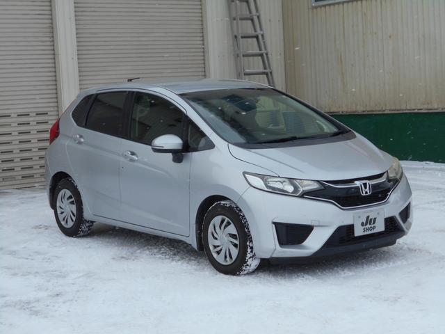 フィット １３Ｇ・Ｆパッケージ　純正ナビ　ＴＶ　Ｂｌｕｅｔｏｏｔｈ　ドライブレコーダー　ＥＴＣ　バックカメラ　衝突被害軽減システム　スマートキー　電動格納ミラー　ＣＶＴ　盗難防止システム　衝突安全ボディ　ＥＳＣ（14枚目）