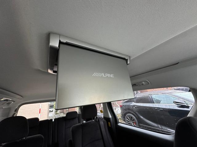 ヴェルファイア ２．４Ｚ　プラチナセレクションＩＩ　タイプゴールド　４ＷＤ寒冷地仕様　両側パワースライドドア　ＡＬＰＩＮＥフリップダウンモニター　ナビ　地デジ　ビルトインＥＴＣ　コーナーセンサー　横滑り防止装置　パワーバックドア　社外アルミホイール夏　バックモニター（17枚目）