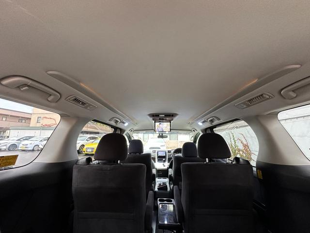 ヴェルファイア ２．４Ｚ　プラチナセレクションＩＩ　タイプゴールド　４ＷＤ寒冷地仕様　両側パワースライドドア　ＡＬＰＩＮＥフリップダウンモニター　ナビ　地デジ　ビルトインＥＴＣ　コーナーセンサー　横滑り防止装置　パワーバックドア　社外アルミホイール夏　バックモニター（25枚目）