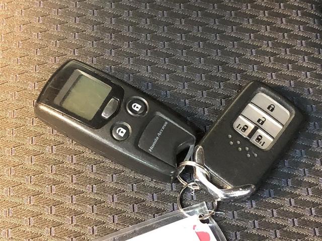 ステップワゴンスパーダ スパーダ オートエアコン 両電動スライドドア ETC車載器 フルタイム4WD LEDライト ミュージックプレイヤー接続可 横滑り防止装置 盗難防止システム スマートキー 3列シート メモリーナビ DVD再生(23枚目)