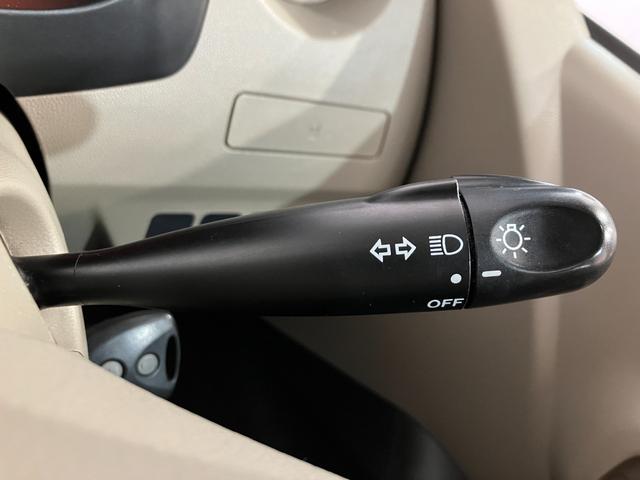 ミラ Ｘスペシャル　４ＷＤ　寒冷地仕様　マニュアル５速　ライトレベライザー　純正オーディオ　キーレスキー　ＣＤ　スペアタイヤ　社外ホイール　ＡＢＳ　Ｗエアバック　パワーウィンドウ（30枚目）