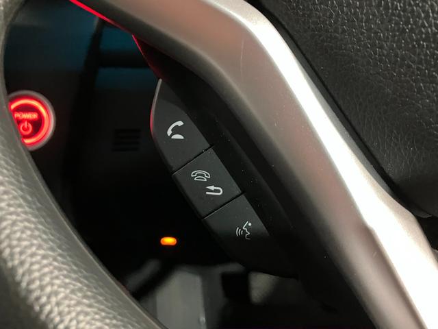 フィットハイブリッド Ｆ　４ＷＤ　寒冷地仕様　ＥＴＣ　バックカメラ　社外ナビ　ワンセグＴＶ　　Ｂｌｕｅｔｏｏｔｈ接続　ハンズフリー　障害物接近アラート　ＬＥＤヘッド・フォグライト　横滑り防止（29枚目）