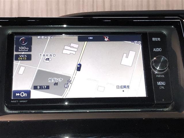 ノア ハイブリッドSi ダブルバイビー ウォークスルー 寒冷地 LEDヘッドライト クルコン 横滑り防止装置 盗難防止システム エアバッグ アルミ メモリ-ナビ スマキー Wエアコン ABS ナビ&TV デュアルエアバッグ ETC DVD(3枚目)