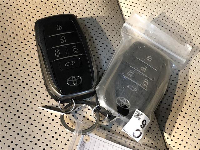 アルファードハイブリッド エグゼクティブラウンジ 本革 寒冷地仕様 フルセグTV アルミホイール パノラミックルーフ 100V電源 LEDヘッドライト 4WD スマートキー DVDプレーヤー パワーシート ETC エアコン メモリーナビ 3列シート(25枚目)