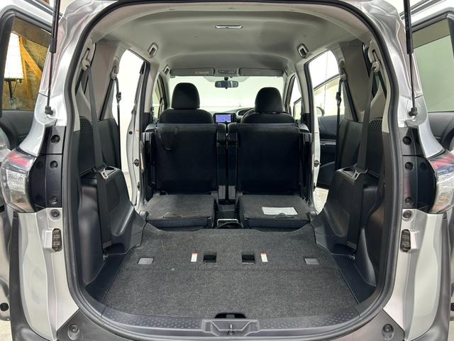 シエンタ Ｘ　４ＷＤ・イクリプスメモリーナビフルセグテレビ・ＣＤ・ＤＶＤ・Ｂｌｕｅｔｏｏｔｈ・パワースライドドア・横滑り防止装置・ライトレベライザー・キーレスエントリー・６人乗り・ＥＴＣ（70枚目）