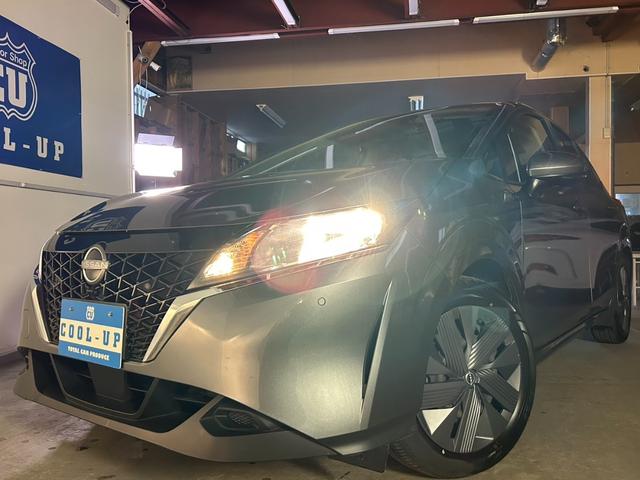 ノート Ｘ　ＦＯＵＲ　４ＷＤ・社外メモリーナビゲーション・Ｂｌｕｅｔｏｏｔｈ・バックカメラ・衝突軽減ブレーキ・横滑り防止・ステアリングヒーター・プッシュスタート・ライトレベライザー・ステアリングヒーターＥＴＣ・レンタアップ（6枚目）