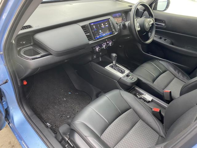 フィット ｅ：ＨＥＶリュクス　４ＷＤ・純正インターナビテレビ・Ｂｌｕｅｔｏｏｔｈ・バックカメラ・衝突軽減ブレーキ・横滑り防止装置・レーンアシスト・クルーズコントロール・クリアランスソナー・フロントシートヒーター・ＬＥＤヘッドライト（68枚目）