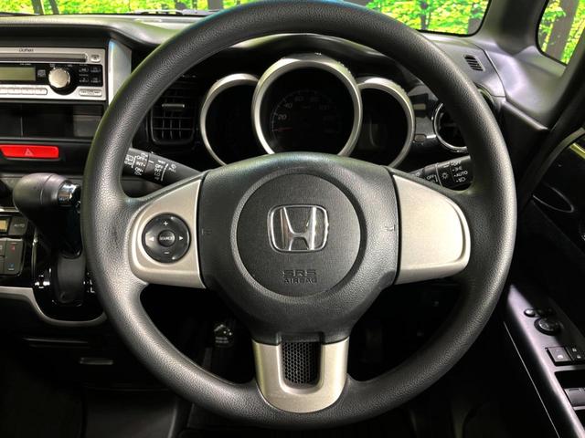 G・Lパッケージ 4WD 電動スライドドア HIDヘッドライト 横滑り防止装置 スマートキー オートライト オートエアコン ステアリングスイッチ リアシートスライド ベンチシート チップアップシート 純正CDオーディオ(13枚目)