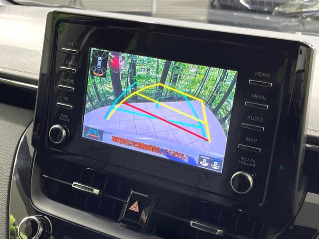 カローラツーリング ハイブリッド　ダブルバイビー　４ＷＤ　純正ディスプレイ　バックカメラ　寒冷地仕様　衝突軽減　１００Ｖ電源　レーダークルーズ　禁煙車　ハーフレザーシート　コーナーセンサー　ＥＴＣ　ＬＥＤヘッド・フォグライト　革巻きステアリング（6枚目）