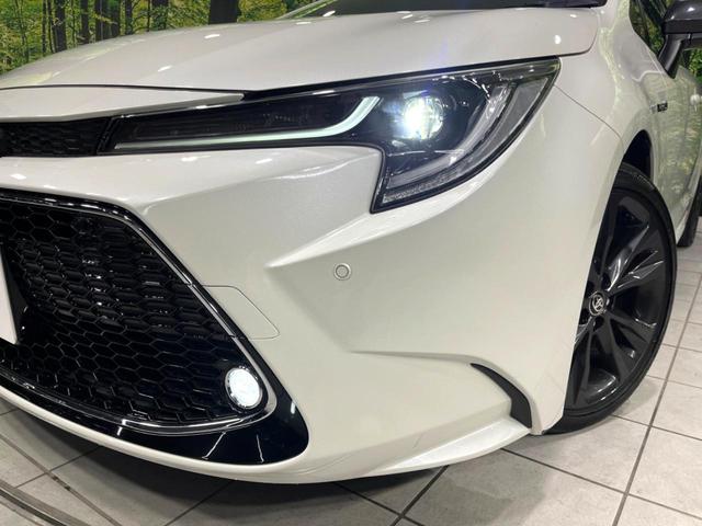 カローラツーリング ハイブリッド　ダブルバイビー　４ＷＤ　純正ディスプレイ　バックカメラ　寒冷地仕様　衝突軽減　１００Ｖ電源　レーダークルーズ　禁煙車　ハーフレザーシート　コーナーセンサー　ＥＴＣ　ＬＥＤヘッド・フォグライト　革巻きステアリング（13枚目）
