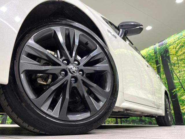 カローラツーリング ハイブリッド　ダブルバイビー　４ＷＤ　純正ディスプレイ　バックカメラ　寒冷地仕様　衝突軽減　１００Ｖ電源　レーダークルーズ　禁煙車　ハーフレザーシート　コーナーセンサー　ＥＴＣ　ＬＥＤヘッド・フォグライト　革巻きステアリング（14枚目）