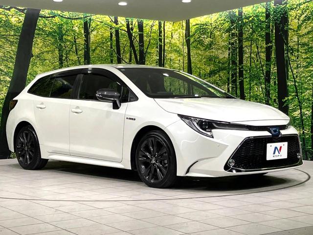 カローラツーリング ハイブリッド　ダブルバイビー　４ＷＤ　純正ディスプレイ　バックカメラ　寒冷地仕様　衝突軽減　１００Ｖ電源　レーダークルーズ　禁煙車　ハーフレザーシート　コーナーセンサー　ＥＴＣ　ＬＥＤヘッド・フォグライト　革巻きステアリング（17枚目）