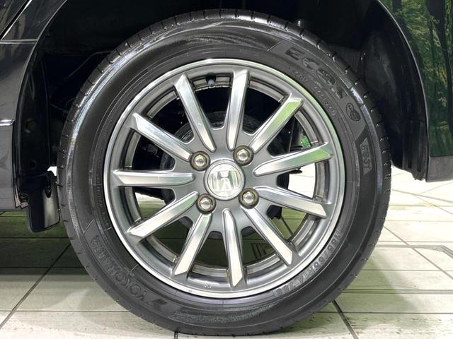 N-WGNカスタム G 4WD 禁煙車 スマートキー HIDヘッド フォグ ETC ステアリングスイッチ オートライト オートエアコン 横滑り防止装置 純正14インチAW USB 革巻きステアリング 盗難防止システム(51枚目)