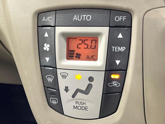 ムーヴ Xリミテッド 4WD 純正ナビ バックカメラ 禁煙車 スマートキー シートリフター オートエアコン 電動格納ミラー 純正14インチアルミ CD 地デジ プライバシーガラス 盗難防止システム(6枚目)