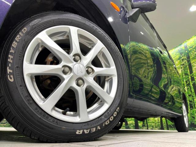 ムーヴ Xリミテッド 4WD 純正ナビ バックカメラ 禁煙車 スマートキー シートリフター オートエアコン 電動格納ミラー 純正14インチアルミ CD 地デジ プライバシーガラス 盗難防止システム(14枚目)