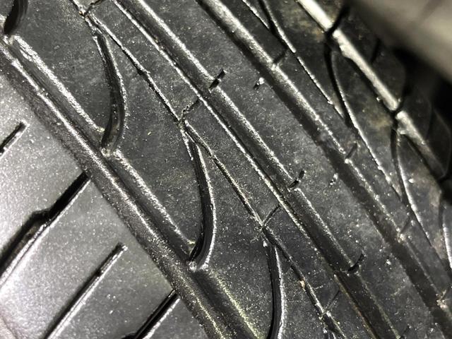 ムーヴ Xリミテッド 4WD 純正ナビ バックカメラ 禁煙車 スマートキー シートリフター オートエアコン 電動格納ミラー 純正14インチアルミ CD 地デジ プライバシーガラス 盗難防止システム(55枚目)