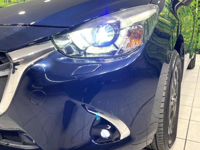 デミオ 15S 4WD 純正ナビ バックカメラ 寒冷地仕様 衝突軽減 禁煙車 前席シートヒーター ドラレコ コーナーセンサー スマートキー LEDヘッド BSM 車線逸脱 誤発進抑制 オートエアコン(14枚目)