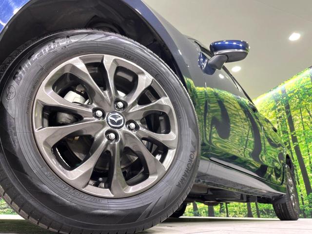 デミオ 15S 4WD 純正ナビ バックカメラ 寒冷地仕様 衝突軽減 禁煙車 前席シートヒーター ドラレコ コーナーセンサー スマートキー LEDヘッド BSM 車線逸脱 誤発進抑制 オートエアコン(15枚目)